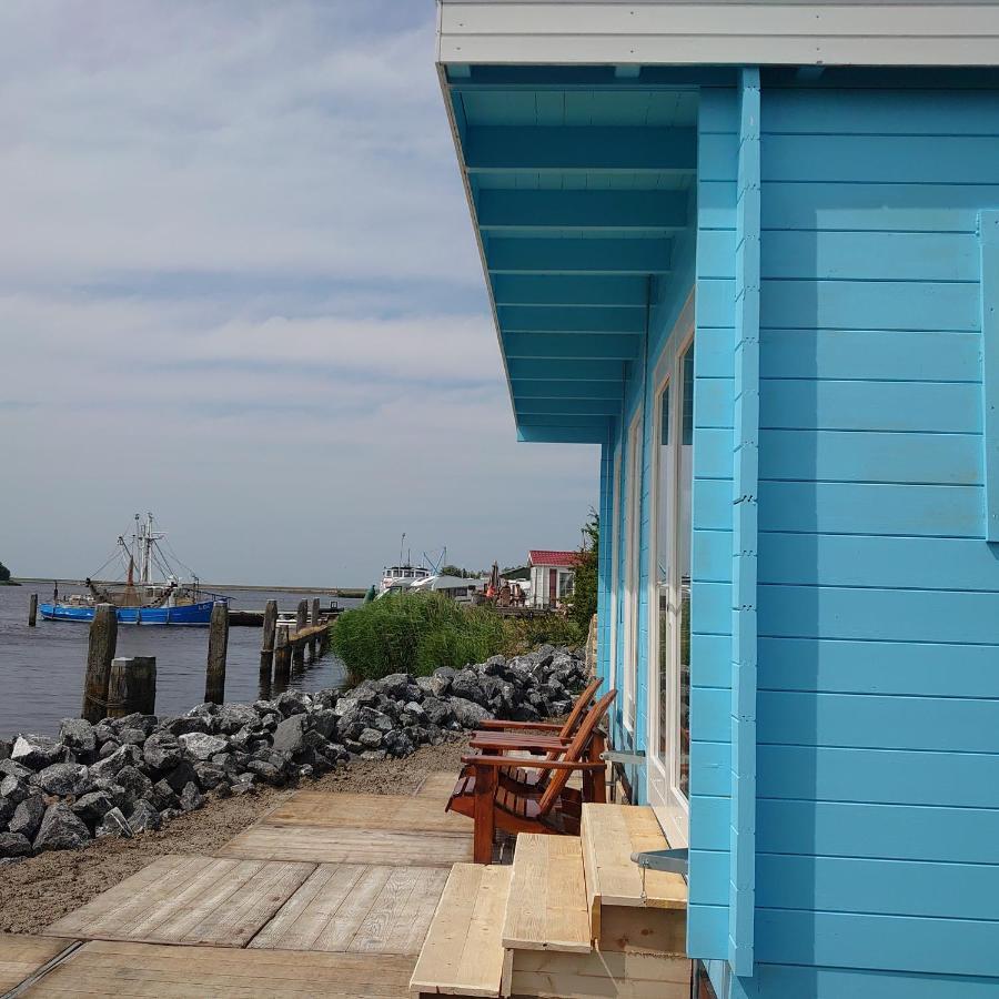 Waterhuisjes Op De Pier Van Lauwersmeerplezier! Lauwersoog Zewnętrze zdjęcie