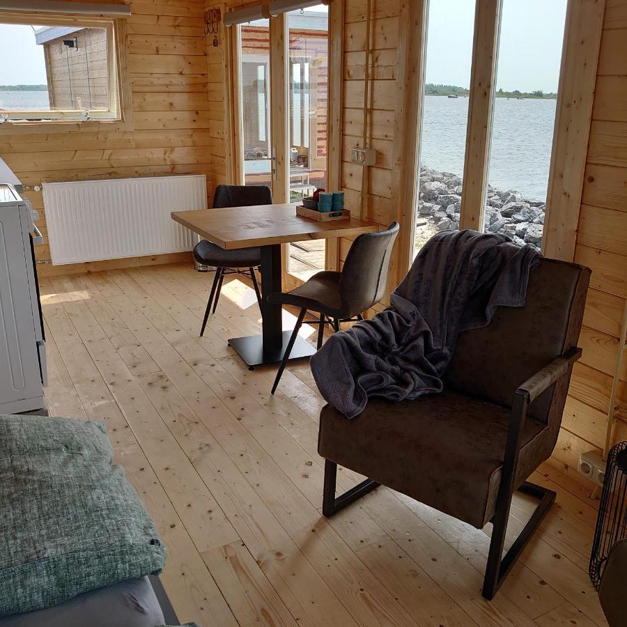 Waterhuisjes Op De Pier Van Lauwersmeerplezier! Lauwersoog Zewnętrze zdjęcie